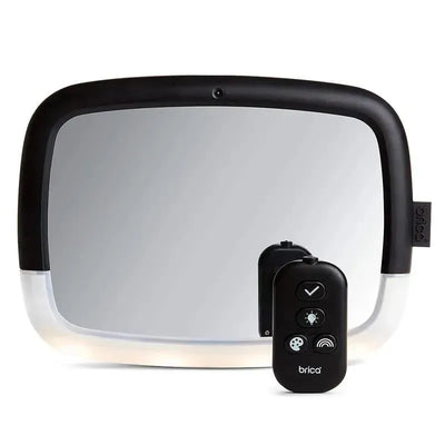 Adjustable rearview mirror for babies with remote control for light settings, featuring a black frame and soft edges.