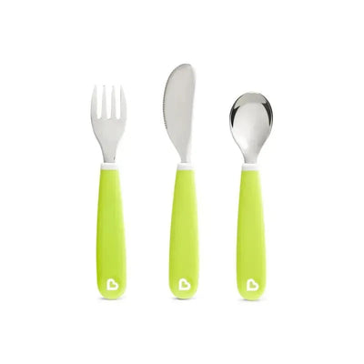 Toddler dining set featuring a fork, knife, and spoon with bright green handles for easy grip.