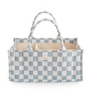 Mushie Baby Diaper Caddy in blue and white checkered pattern, designed to organize newborn essentials.