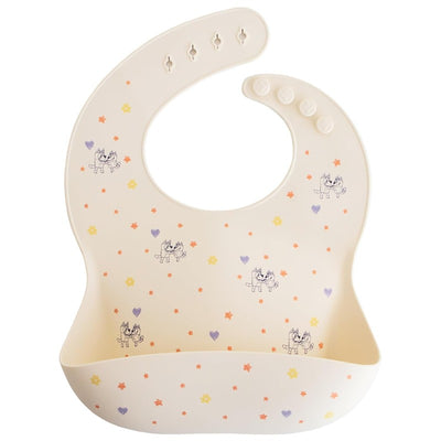 Silicone baby bib in ivory with colorful patterns of flowers and cartoon characters, designed to catch spills during mealtime.