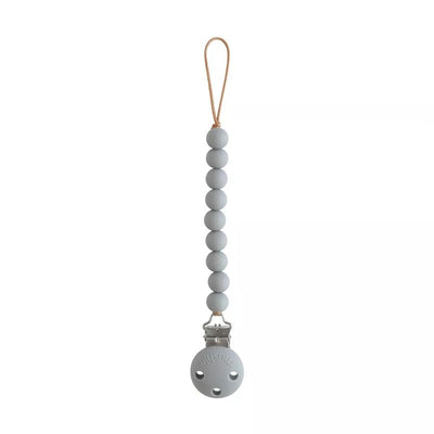 Silicone pacifier clip by Mushie in stone color, featuring a beaded design and a sturdy clip for attachment.