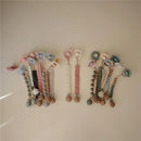 Mushie - Linen Pacifier Clip – 2 Pack, Dusty Rose/Shifting Sand Image 2