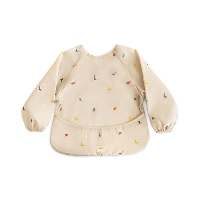 Water-resistant long sleeve baby bib featuring a playful dinosaur pattern, designed for adjustable fit.