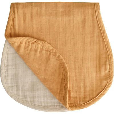 Organic cotton muslin burp cloths in fall yellow and fog colors, featuring a soft, textured surface.