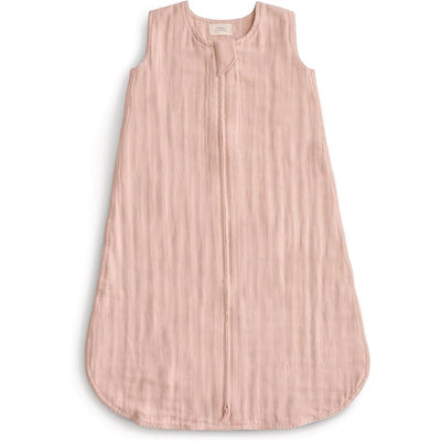 Mushie Muslin Sleep Bag in blush color, featuring a sleeveless design and front zipper for easy dressing.