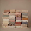 Mushie Organic Cotton Muslin Swaddle Blanket - Fall Yellow Image 9