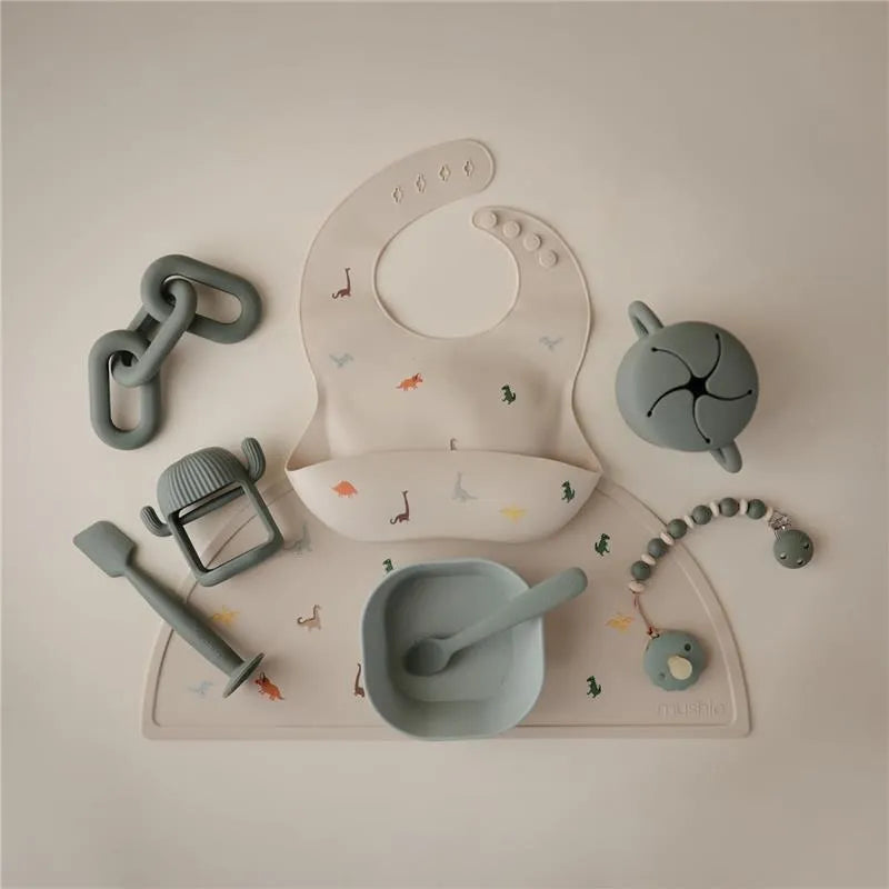 Mushie - Silicone Baby Bib, Dinosaurs Image 3