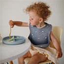 Mushie Silicone Baby Bib - Planets Image 5