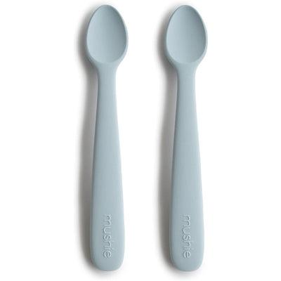 Silicone feeding spoons in powder blue, two-pack, designed for safe feeding of infants.