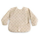 Water-resistant long sleeve baby bib featuring a cherry pattern and adjustable fit, designed for mealtime protection.