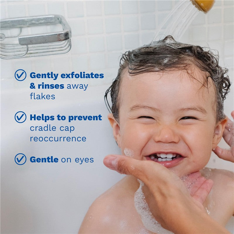 Mustela Foam Shampoo for Newborns, 5.07 fl oz, being used on a smiling baby during a bath, with key benefits listed.