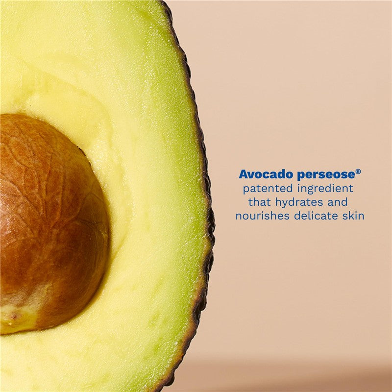 Sliced avocado showcasing the seed, with text highlighting avocado perseose® as a moisturizing ingredient for delicate skin.