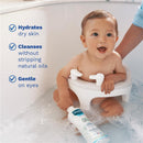 Mustela Gentle Cleansing Gel bottle held by a smiling baby in a bath; features hydration, cleansing, and gentleness claims.