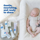 Five Mustela newborn care products displayed beside a sleeping baby, highlighting gentle, nourishing skincare.