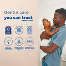 Mustela Stelatopia Cleansing Gel packaging features a parent holding a baby, with text highlighting gentle care, safety for newborns, and natural ingredients.