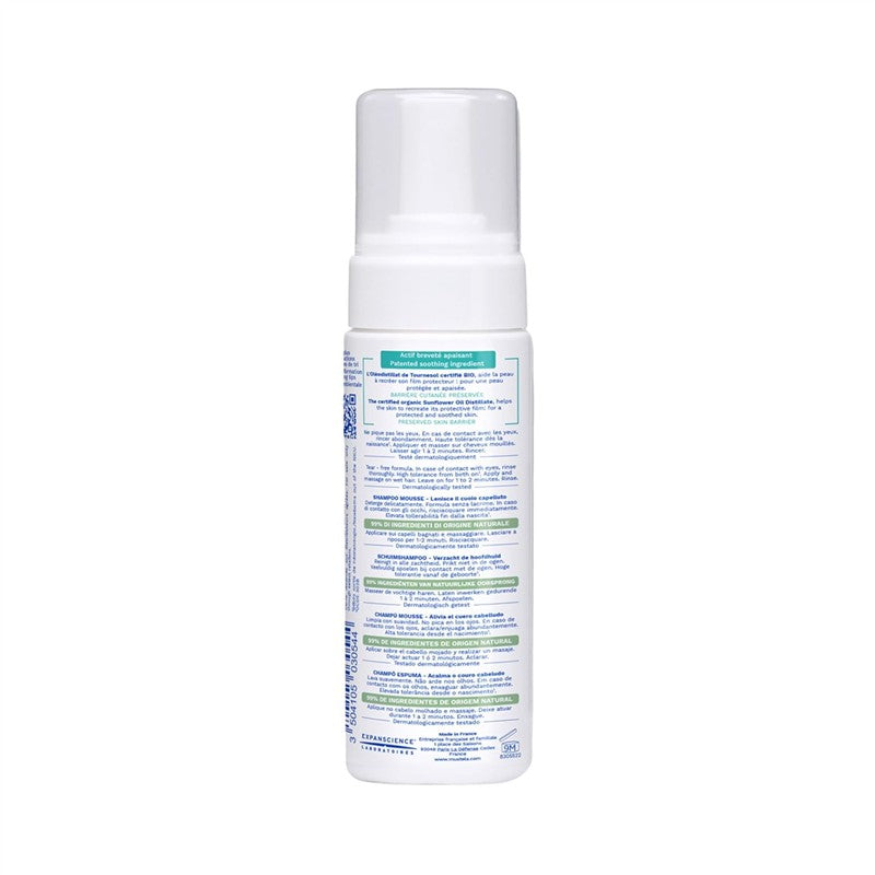 Mustela Stelatopia Foam Shampoo in a 5.07 fl oz bottle, featuring soothing ingredients and directions for use on the label.