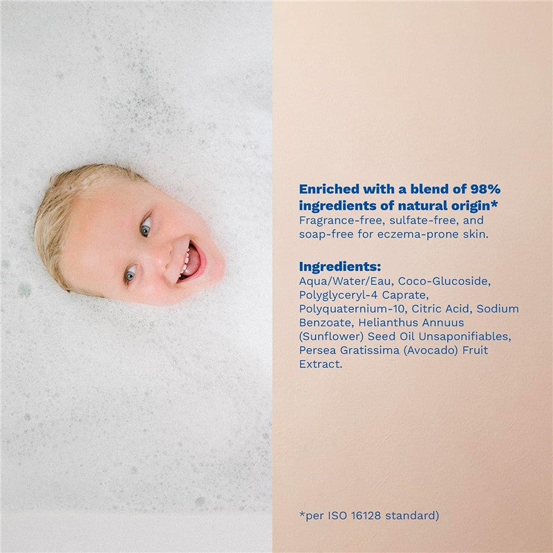 Mustela Stelatopia Foam Shampoo with a child playfully smiling in foamy water. Text highlights its natural ingredients and skin-friendly properties.