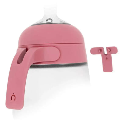 Flexy silicone baby bottle in pink with a quick snap handle and a separate silicone handle clip.