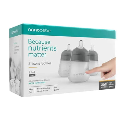 Gray Nanobebe silicone baby bottles in a 3-pack, featuring a soft feel, 9oz capacity, and anti-colic venting system.