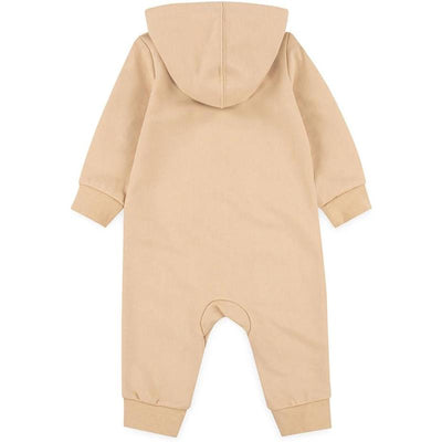 Hooded beige baby coverall from Nike for 18-month-olds, featuring long sleeves and elastic cuffs.