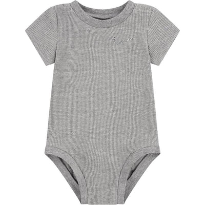 Nike Baby Readyset Bodysuit in carbon heather gray with short sleeves and a small logo on the chest.