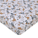 Disney Mickey Mouse patterned crib bedding set featuring playful designs of Mickey, Pluto, and stars.