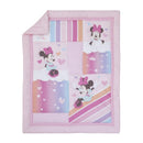 Disney Minnie Mouse Be Happy Nursery Mini Crib Bedding Set featuring colorful patches with Minnie Mouse illustrations and hearts.