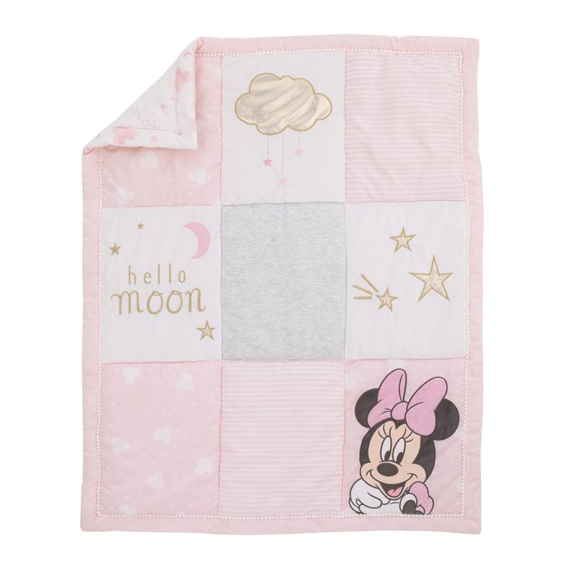 Crib bedding set featuring a patchwork quilt with Minnie Mouse, stars, and clouds, in soft pink and gray colors.