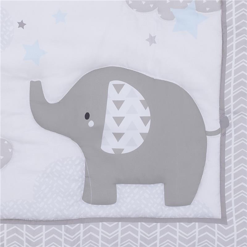 Gray elephant design with a patterned ear on a white crib bedding set, featuring stars and clouds.