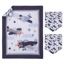 Mini crib bedding set featuring a quilt with plane designs and cloud patterns, plus two fitted crib sheets.