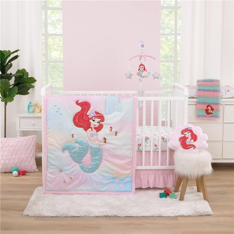 NoJo Disney Ariel Watercolor Wishes Changing Pad Cover featuring Ariel in a pastel design, displayed in a nursery setting with decor.