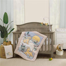 Nojo Disney Lion King Simba musical mobile above crib with colorful blanket featuring Simba and sun in a nursery setting.