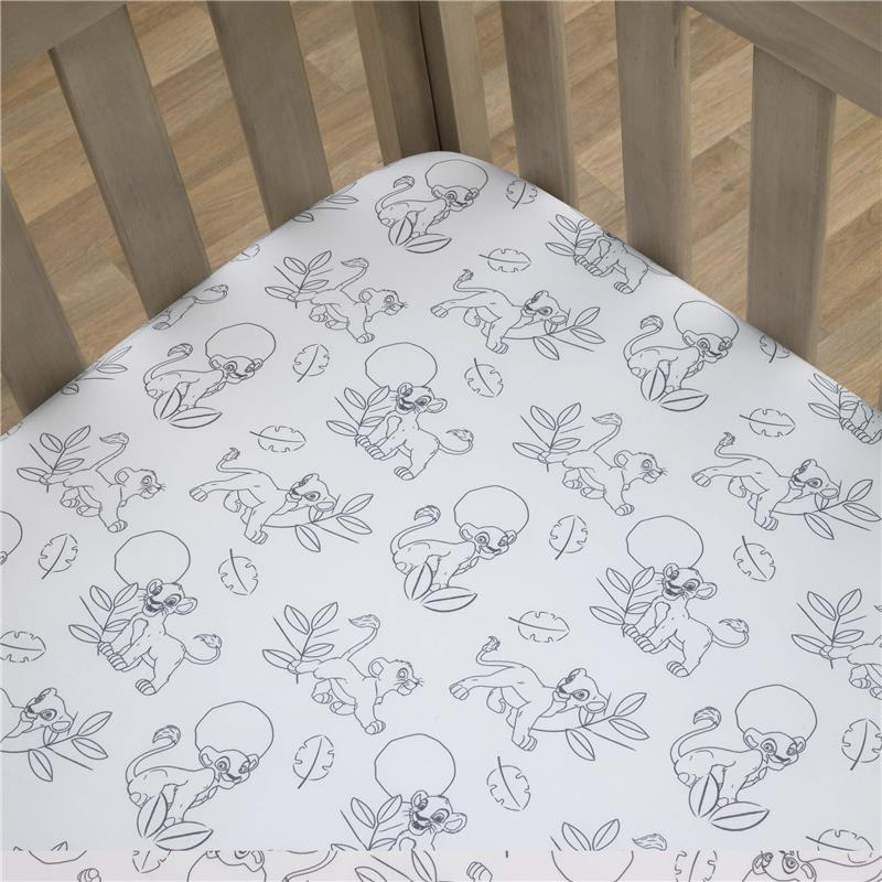 Super soft fitted crib sheet featuring Lion King characters and leafy designs, perfect for a nursery.