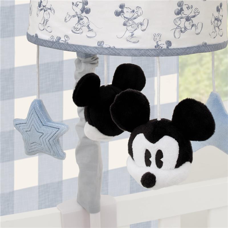 Musical mobile featuring plush Mickey Mouse head and a blue star, set against a white with blue checkered background.