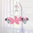 Pink plush Minnie Mouse musical mobile with bows, designed for baby nursery decor, featuring plush characters and soft textures.