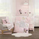 NoJo Disney Minnie Mouse Twinkle Twinkle Minnie Musical Mobile in a pastel nursery featuring a quilt, pillow, and wall art.