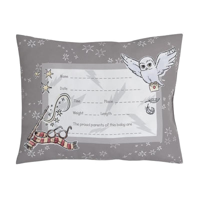 Keepsake pillow featuring a Harry Potter theme, with space for baby details and illustrations of an owl, wand, and glasses.