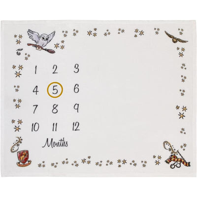 Milestone blanket featuring a calendar with numbers 1-12, an owl, stars, and a Gryffindor crest, designed for memory-making.