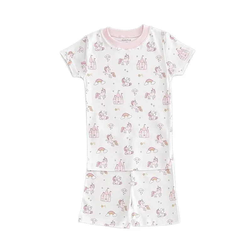 Short sleeve pajama set for baby girls featuring a unicorn and castle pattern in pastel colors.
