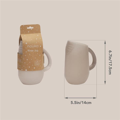 Nouka Bath Rinse Jug in beige, featuring a handle and a branded cardboard packaging, with dimensions 6.7in x 5.5in.