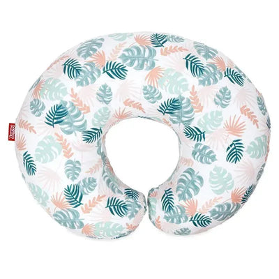 Support pod nursing pillow featuring a tropical leaf design in greens and pastel colors, designed for infant breastfeeding.