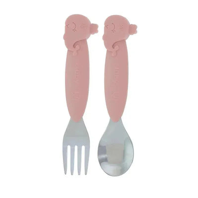 Pink Nuby whale-shaped fork and spoon set featuring silicone handles and stainless steel heads.