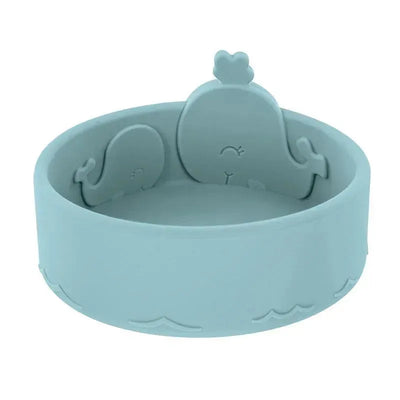 Silicone whale feeding bowl in blue, featuring cute whale designs on the sides and a smooth interior for easy cleaning.