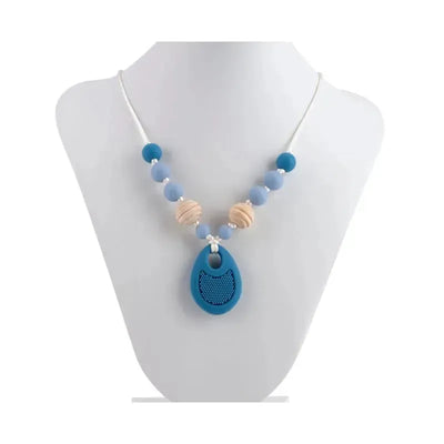 Silicone pendant necklace featuring blue and natural wood beads, designed for teething babies.