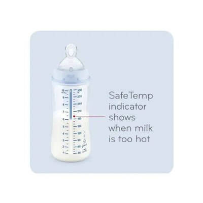 Nuk baby boy bottle with 10 oz capacity, featuring a SafeTemp indicator and graduated measurement markings.