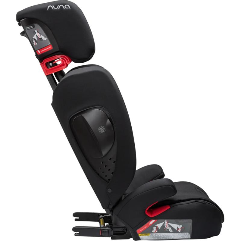 Nuna child car seat with red harness, adjustable headrest, and safety labels for secure travel