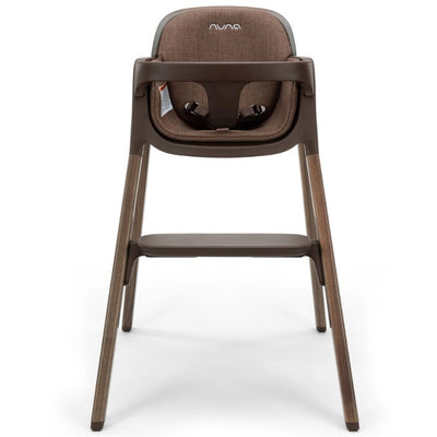 Nuna BRYN High Chair in Clove color, featuring a modern design with a padded seat and harness system.