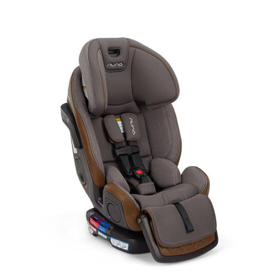 Nuna EXEC™ next All-in-One Car Seat in Granite color; features plush fabric, adjustable harness, and flip-forward armrests.