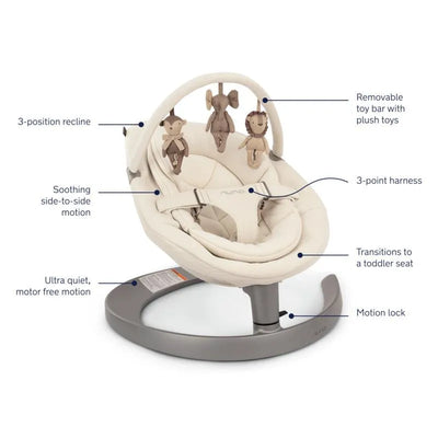 Nuna LEAF™ grow Baby Seat & Rocker in Cloud features a soft, beige seat with plush toy bar, 3-point harness, and side-to-side motion.