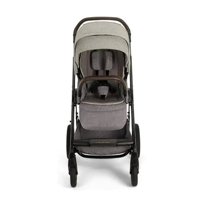 Nuna MIXX™ next stroller in Monterey color with a magnetic buckle, featuring a sleek design and adjustable canopy.